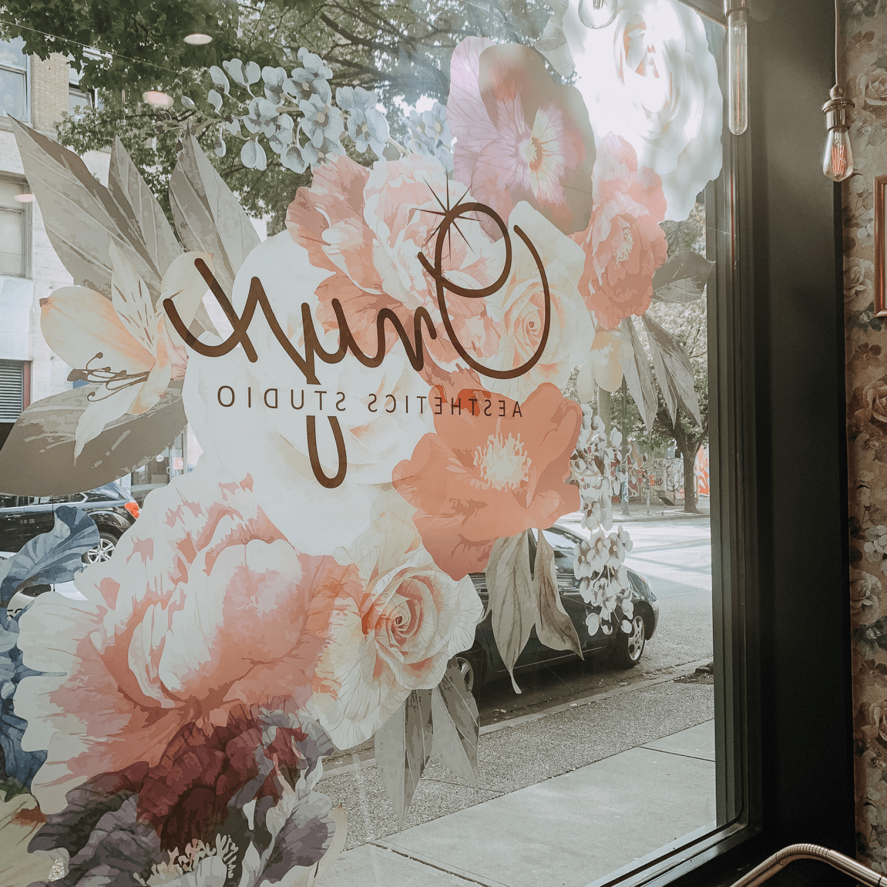 Elevating Storefront Aesthetics: Urbanwalls' Creative Transformation for Onyx Aesthetic Studio