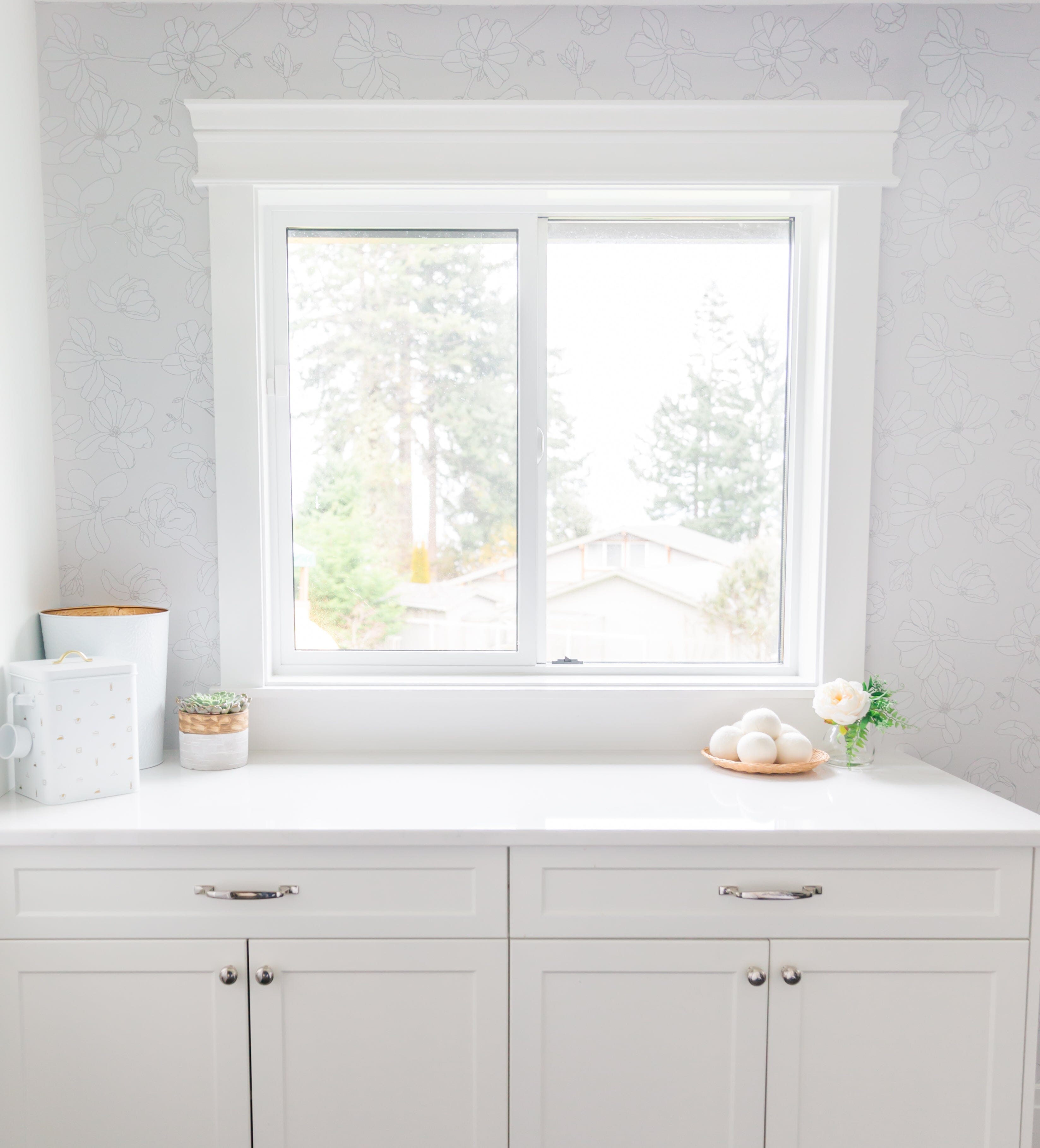 How To Make Your Laundry Room Feel Bigger, Brighter, And Less Overlooked