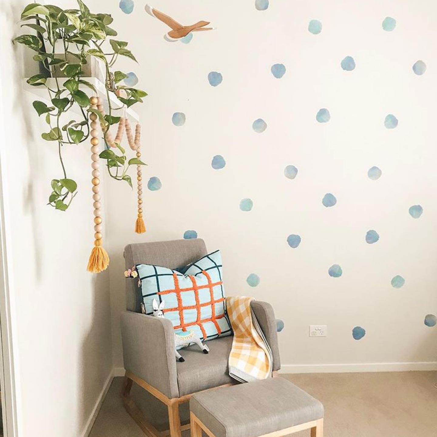 Room with blue watercolor polka dot wall decals